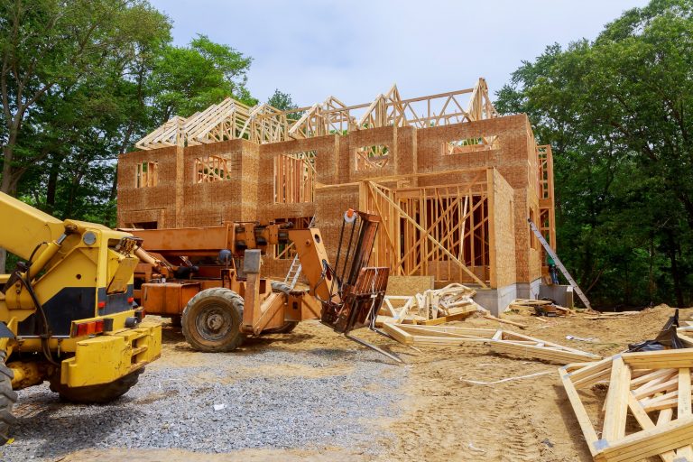 American residential beams of home in wooden frame house under construction